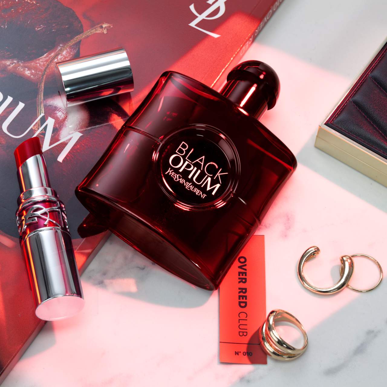 Black Opium Eau De Parfum Over Red Travel Spray With Cherry & Coffee ...